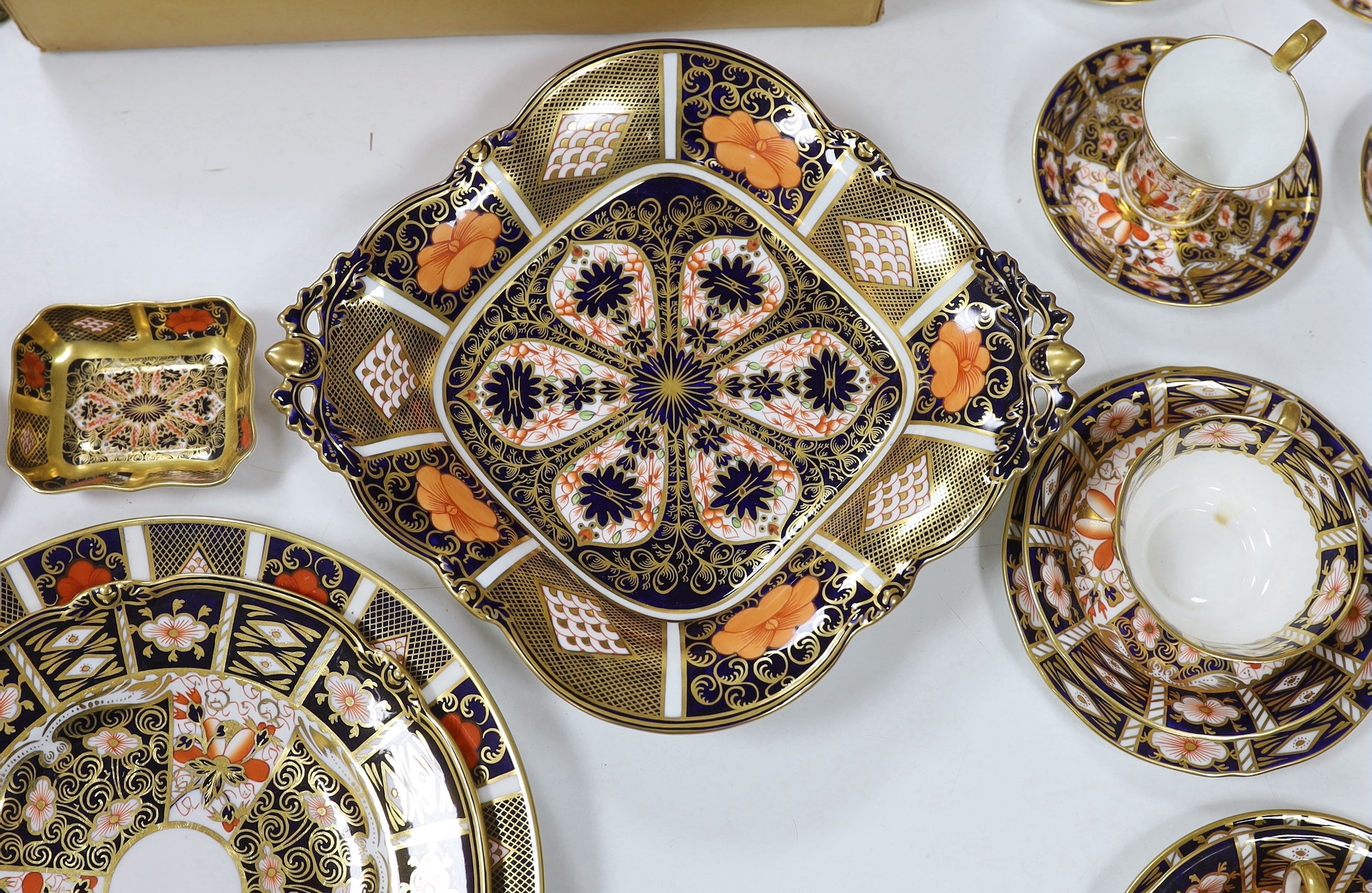 A collection of Royal Crown Derby Imari porcelain, largest 27cm in diameter